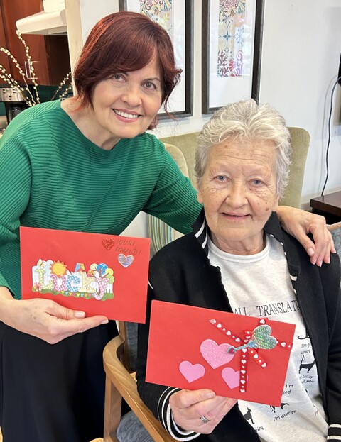 Residents at Hayworth House holding Valentines
